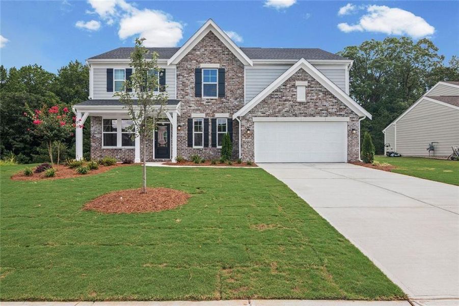 Front exterior of a new home in Pickens Bluff, Dallas, GA, highlighting curb appeal (Image 18).