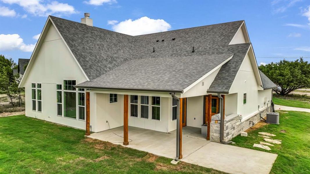 Exterior details and patio area of a home in Oak Water Ranch, Granbury (Image 3).