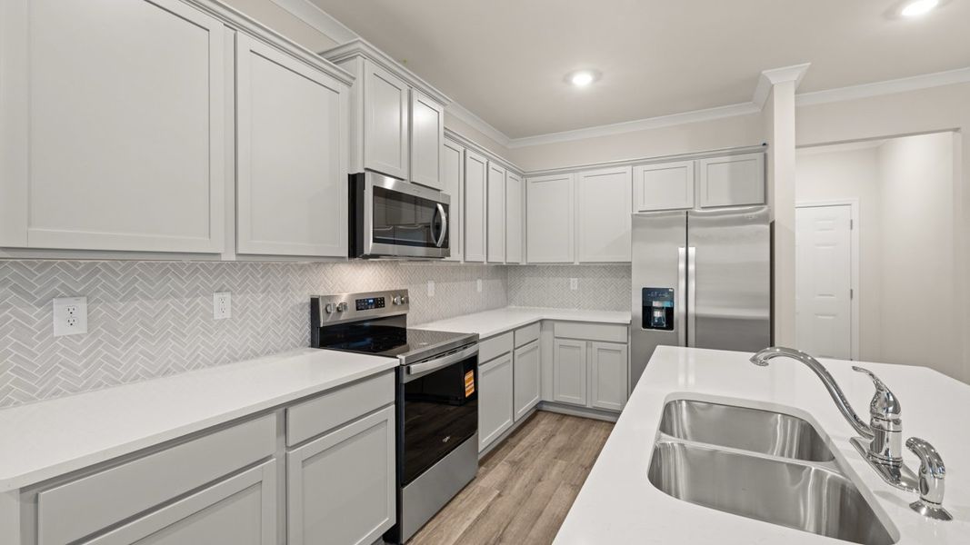 Furnished interior view inside a new home in Independence Villas and Townhomes, Loganville (Image 7).