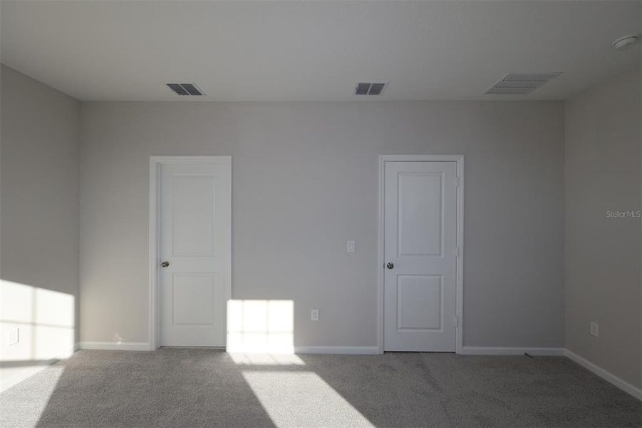 Spacious, unfurnished interior of a new home in Tribute at Ovation, Winter Garden (Image 33). Spacious, unfurnished interior of a new home in Tribute at Ovation, Winter Garden (Image 33).