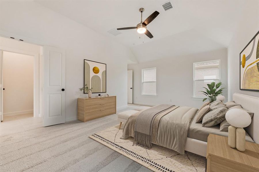 Carpeted bedroom with vaulted ceiling and ceiling fan Carpeted bedroom with vaulted ceiling and ceiling fan