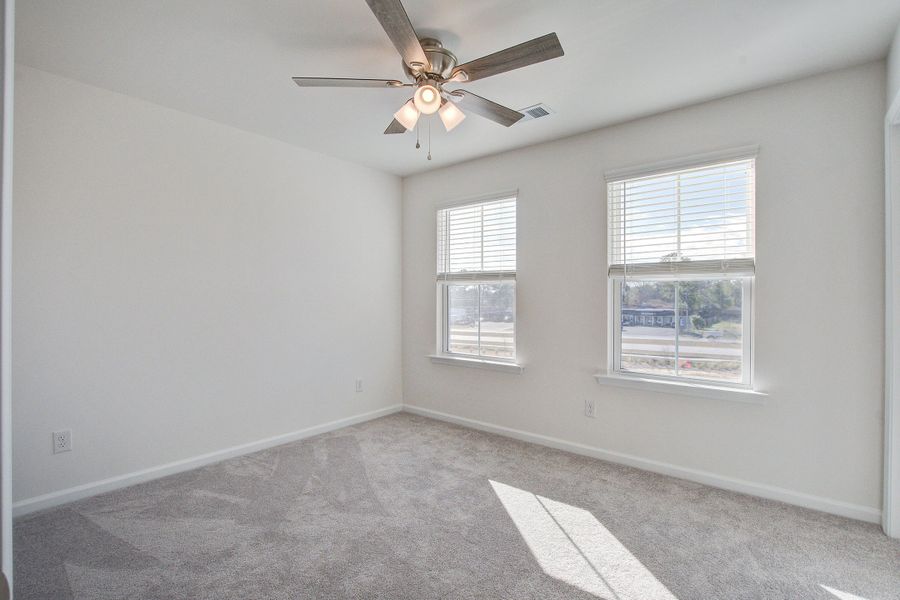 Spacious, unfurnished interior of a new home in Clear Springs Townhomes, North Charleston (Image 29).