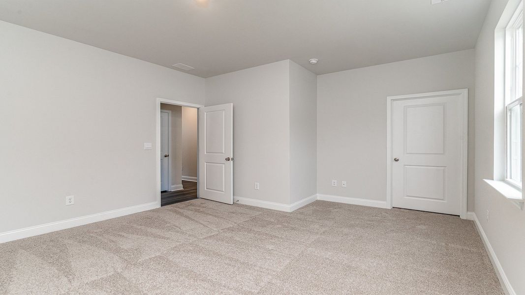 Representative unfurnished interior of a home built from the Westerly by D.R. Horton in Lake Tide Summit, Chapin (Image 22).