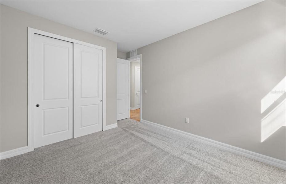 Spacious, unfurnished interior of a new home in The Strand at Cedar Grove, North Port (Image 15).