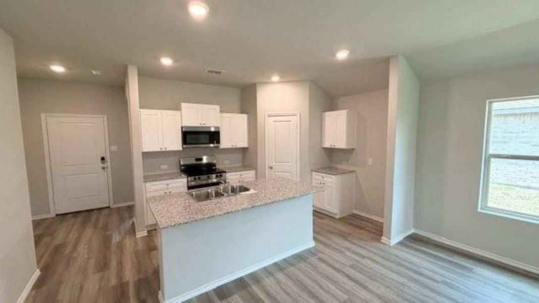 Furnished interior view inside a new home in Sandy Beach, Azle (Image 6).