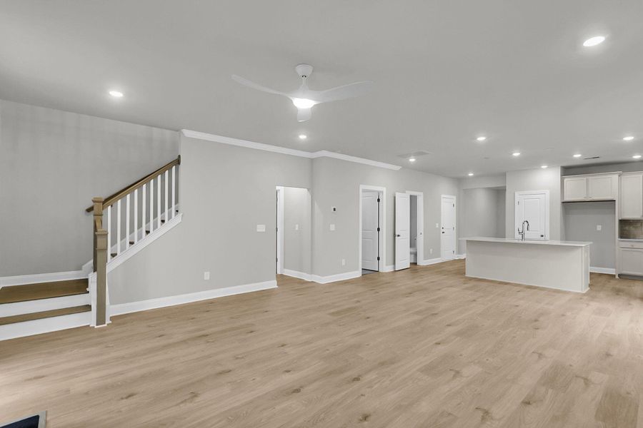 Spacious, unfurnished interior of a new home in Tidewater at Lakes of Cane Bay, Summerville (Image 18).