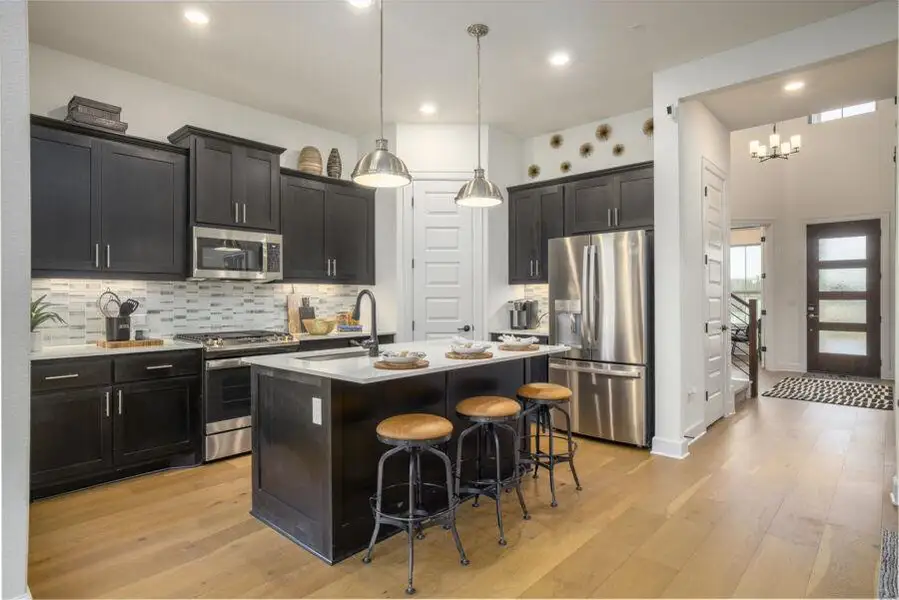 Furnished interior view inside a new home in Cascades at Onion Creek, Austin (Image 9). Furnished interior view inside a new home in Cascades at Onion Creek, Austin (Image 9).