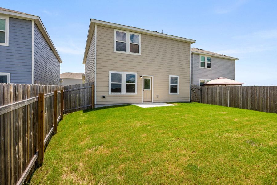 Front exterior of a new home in Cottonwood Farms, Hutto, TX, highlighting curb appeal (Image 21).