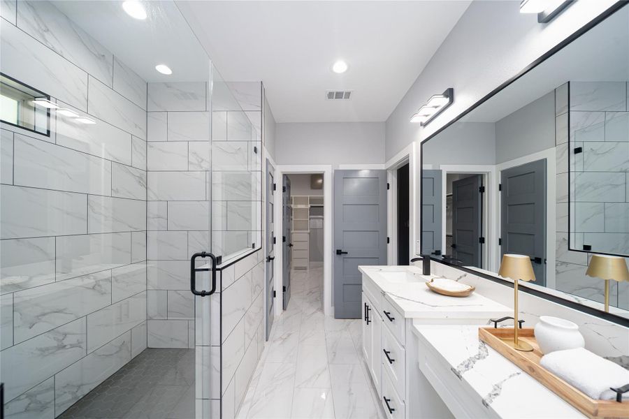 Double sink view, expansive walk in shower, water closet & great walk in closet straight ahead Double sink view, expansive walk in shower, water closet & great walk in closet straight ahead