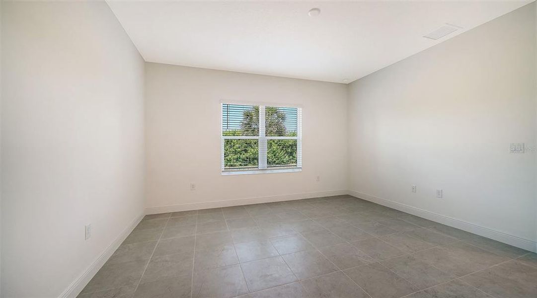 Spacious, unfurnished interior of a new home in Windward Real Estate and Homes for Sale in Sarasota, FL - Neal Communities, Lakewood Ranch (Image 32).