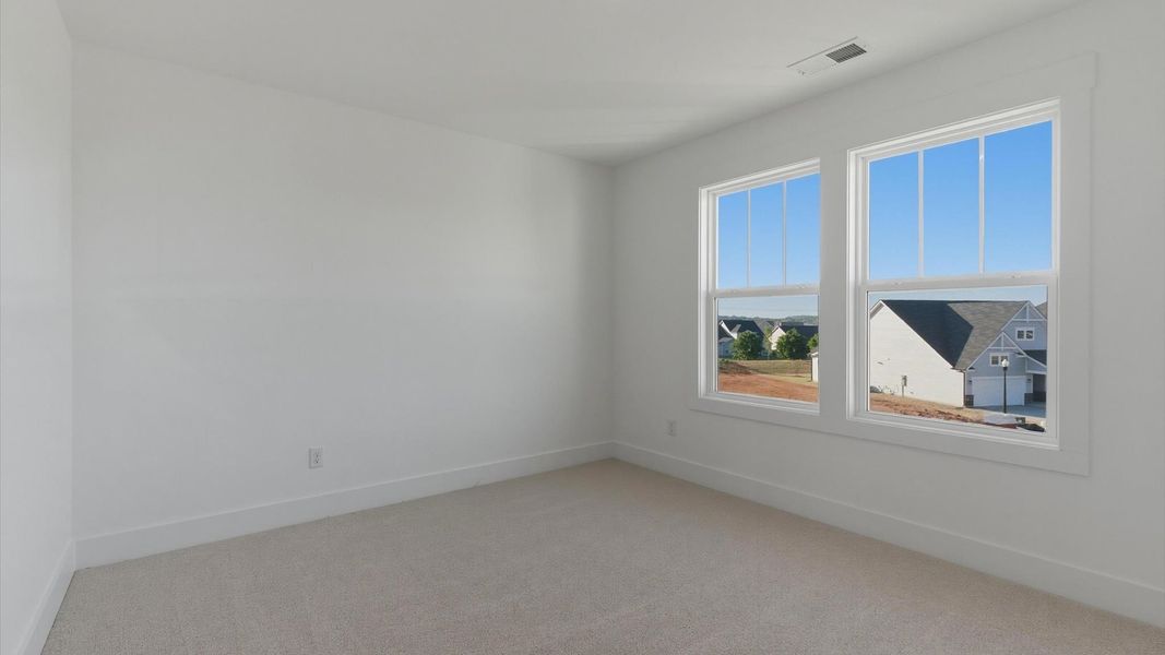 Furnished interior view inside a new home in Benjamin's Grove, Woodruff (Image 24).