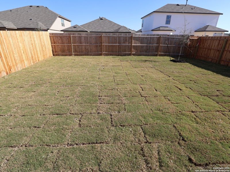 Exterior details and patio area of a home in Winding Brook, San Antonio (Image 22).