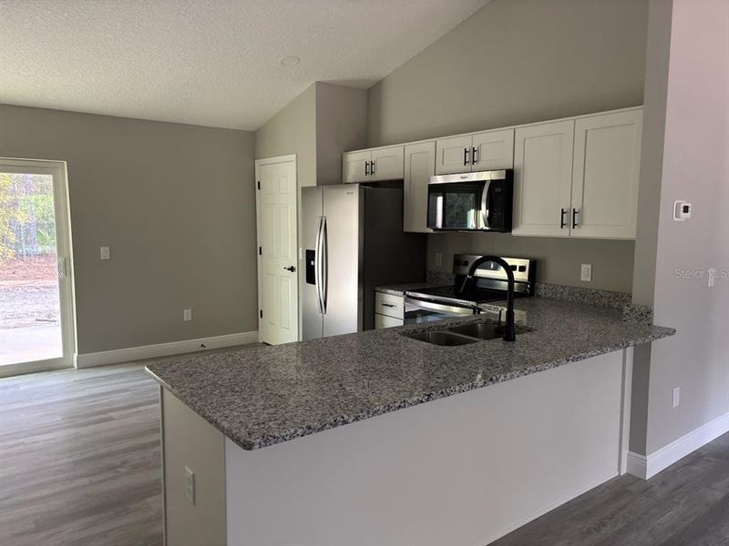 Furnished interior view inside a new home in , Dunnellon (Image 4).