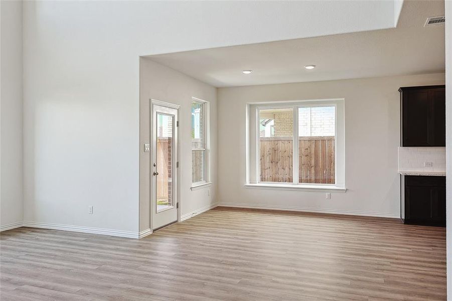 Unfurnished living room featuring light hardwood / wood-style flooring