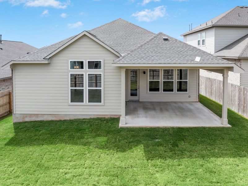 Exterior details and patio area of a home in University Heights, Round Rock (Image 24).