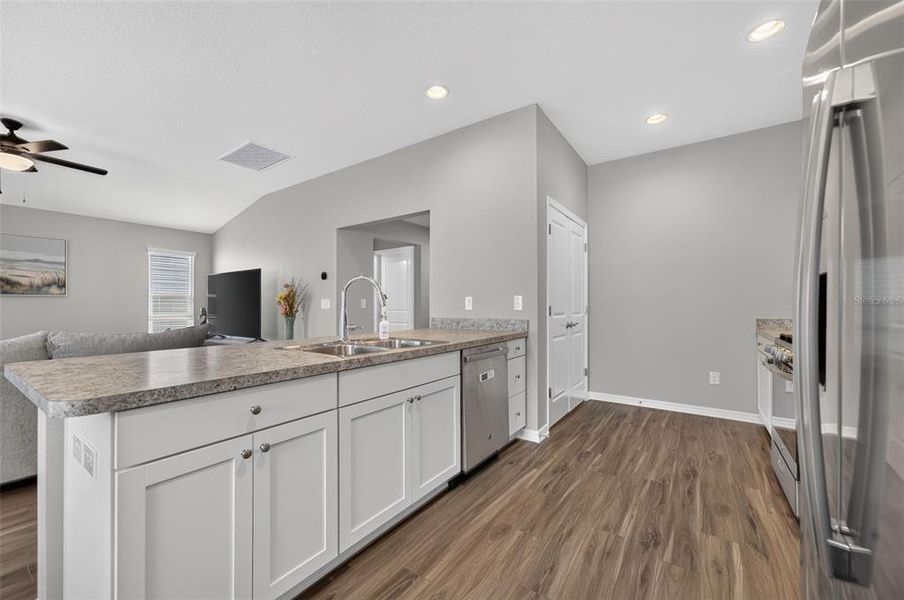 Furnished interior view inside a new home in , The Villages (Image 13).