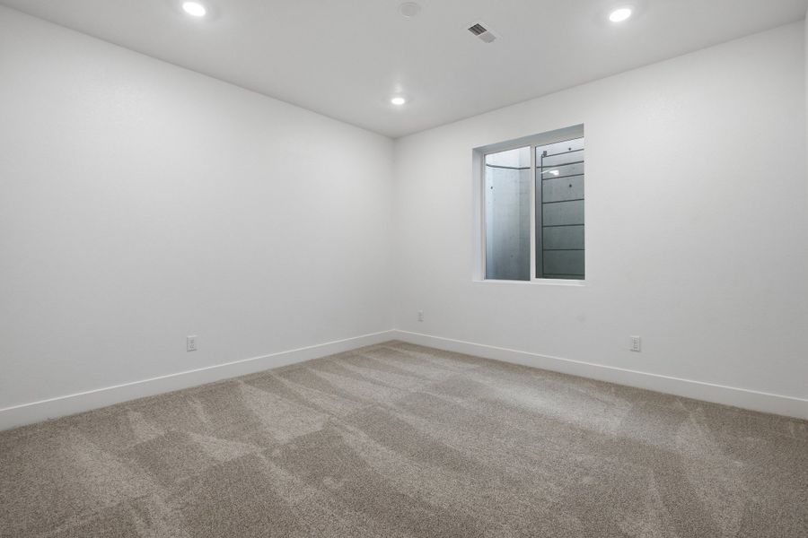 Spacious, unfurnished interior of a new home in Trailstone, Arvada (Image 28).
