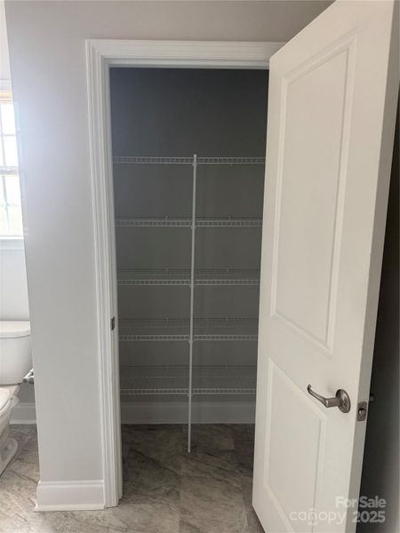 Linen Closet in Primary Bath