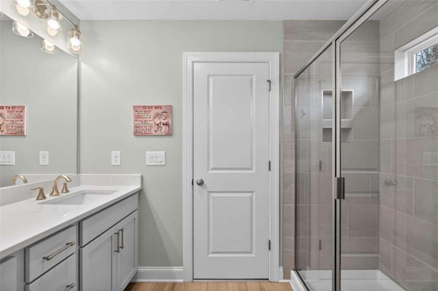 Furnished interior view inside a new home in The Village at Towne Lake, Woodstock (Image 20).