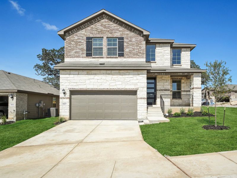 Front exterior of the Medina floorplan at a Meritage Homes community.