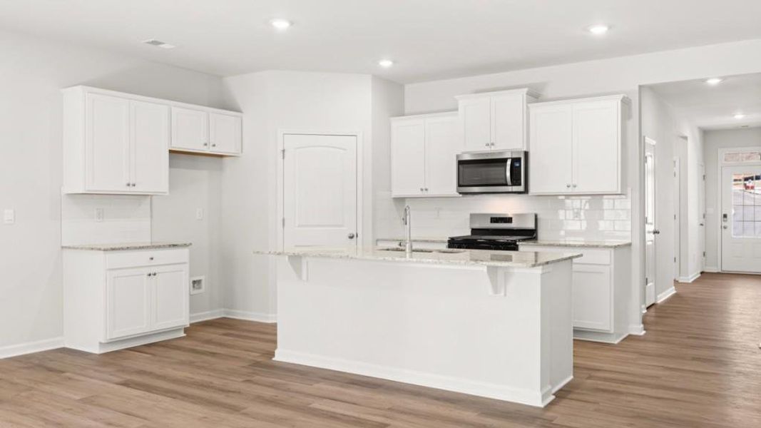 Furnished interior view inside a new home in South Wind, Fairburn (Image 4).