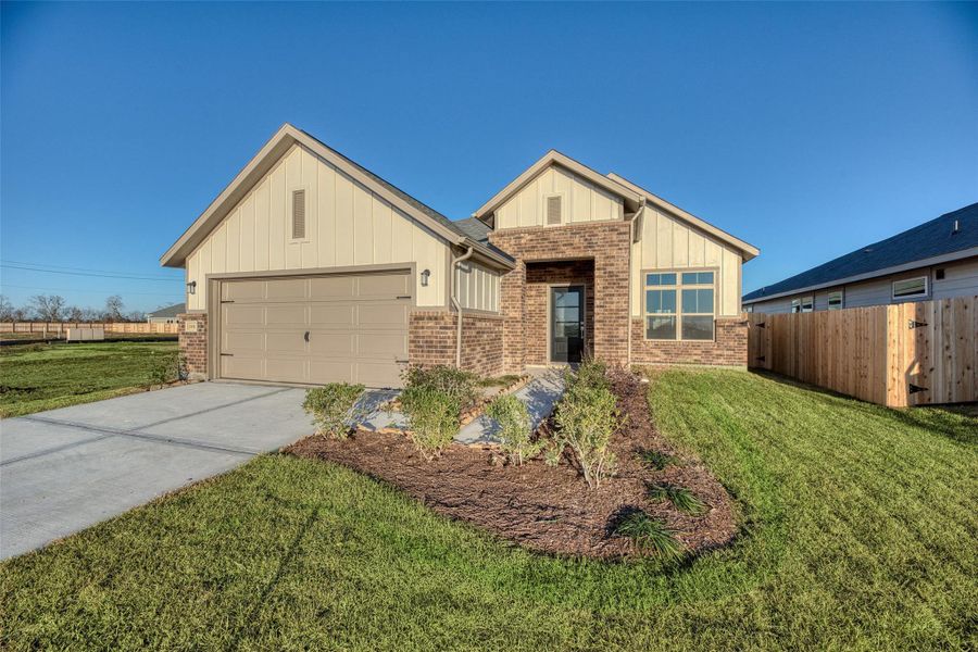 Front exterior of a new home in Aldeana - Paintbrush Collection, Bonney, TX, highlighting curb appeal (Image 2). Front exterior of a new home in Aldeana - Paintbrush Collection, Bonney, TX, highlighting curb appeal (Image 2).