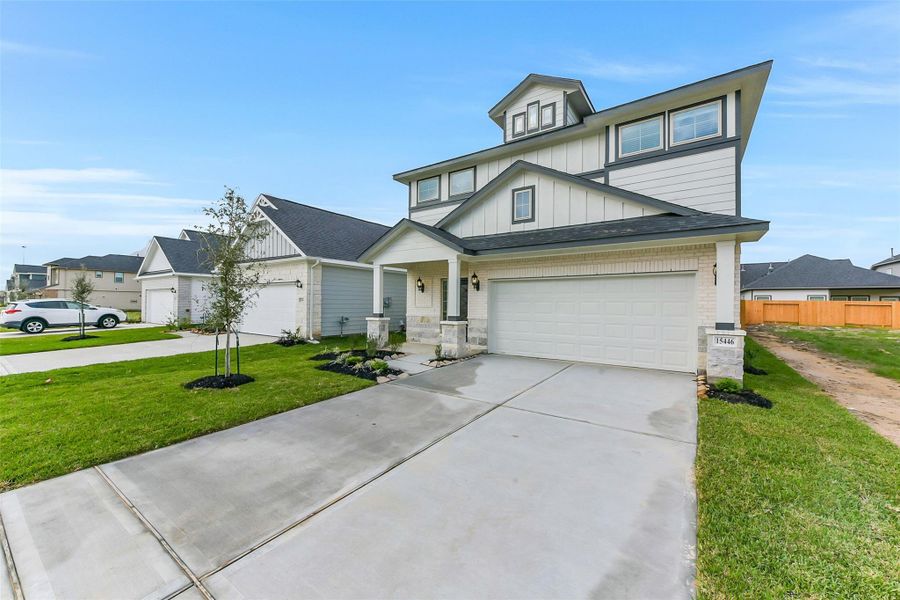 Front exterior of a new home in Anderson Lakes, Houston, TX, highlighting curb appeal (Image 25).