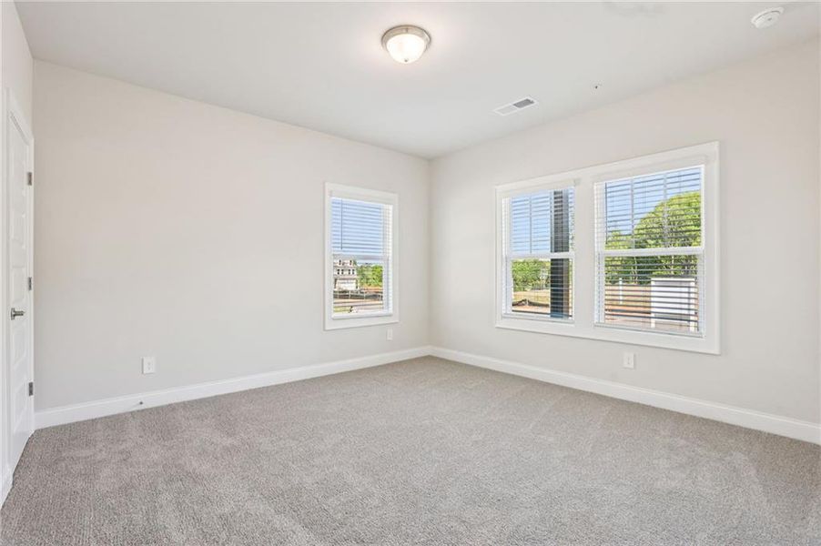 Spacious, unfurnished interior of a new home in Hemingway - Highland Series, Cumming (Image 38).