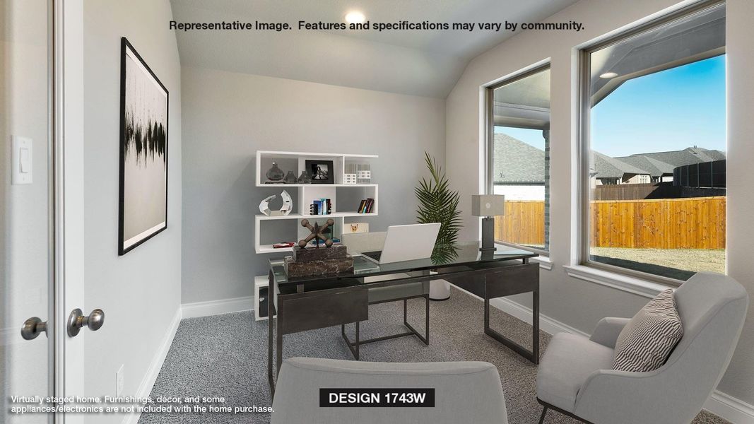 Home office featuring carpet flooring and lofted ceiling