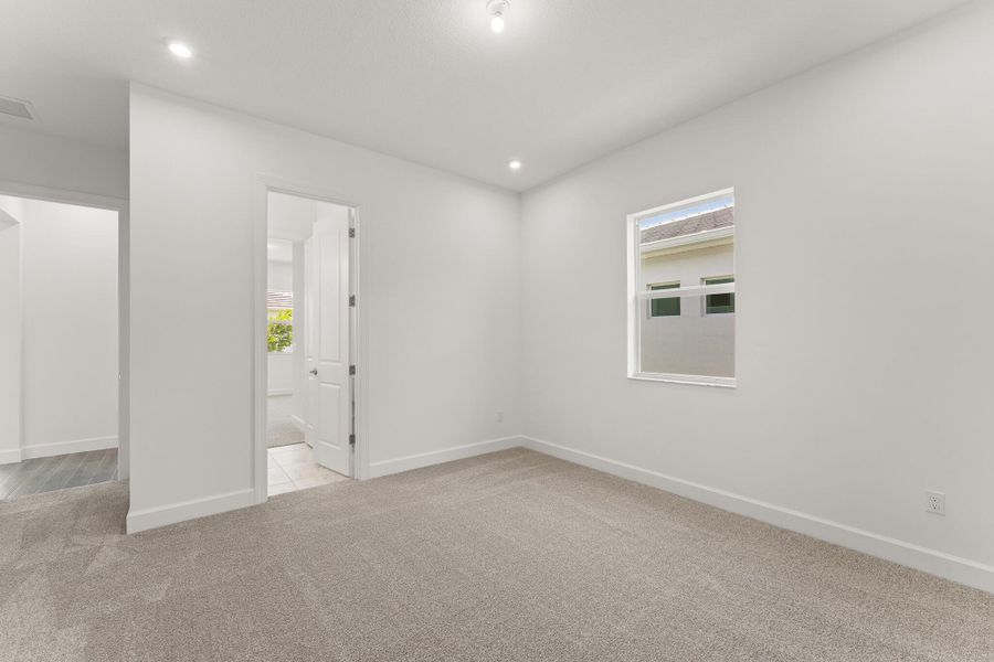 Spacious, unfurnished interior of a new home in Tradition - Seville, Port St. Lucie (Image 13).