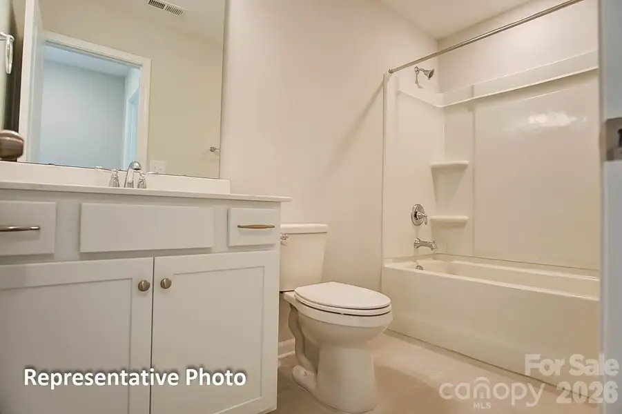 Furnished interior view inside a new home in Heritage - 55+ Community, Indian Trail (Image 5).