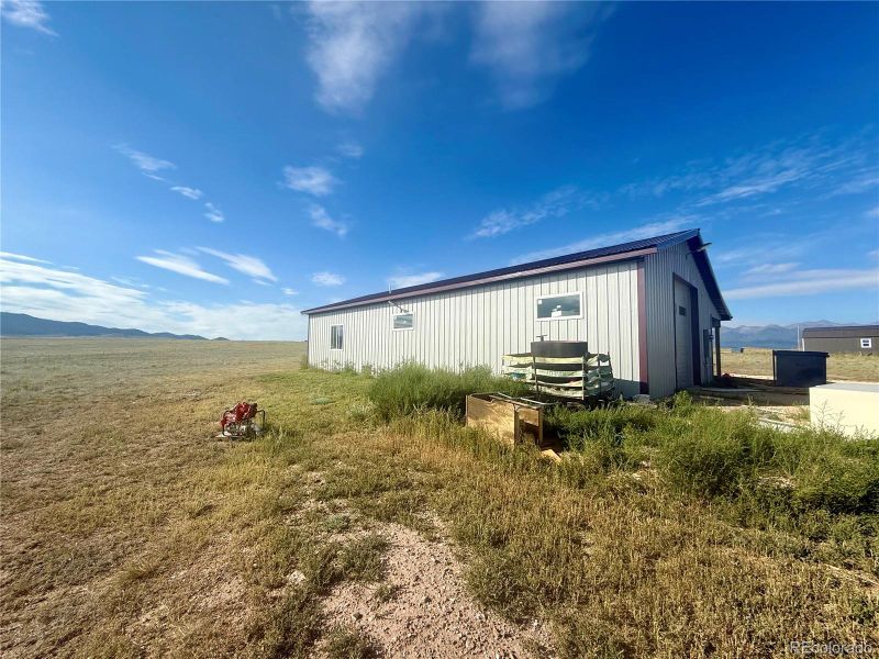 Front exterior of a new home in , Westcliffe, CO, highlighting curb appeal (Image 11).