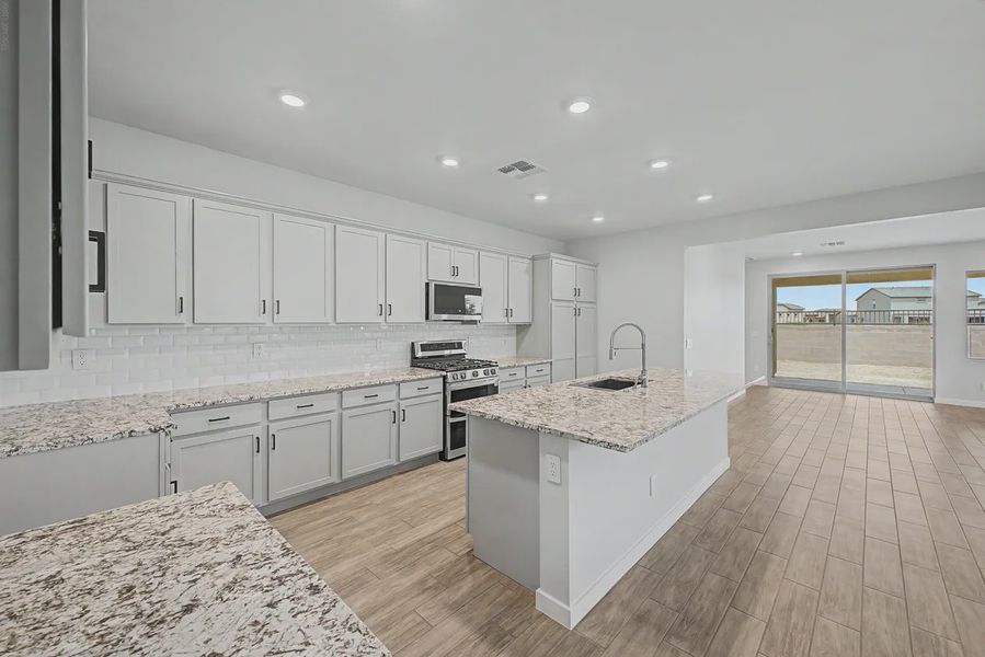 Furnished interior view inside a new home in Avanti at Granite Vista, Waddell (Image 8).