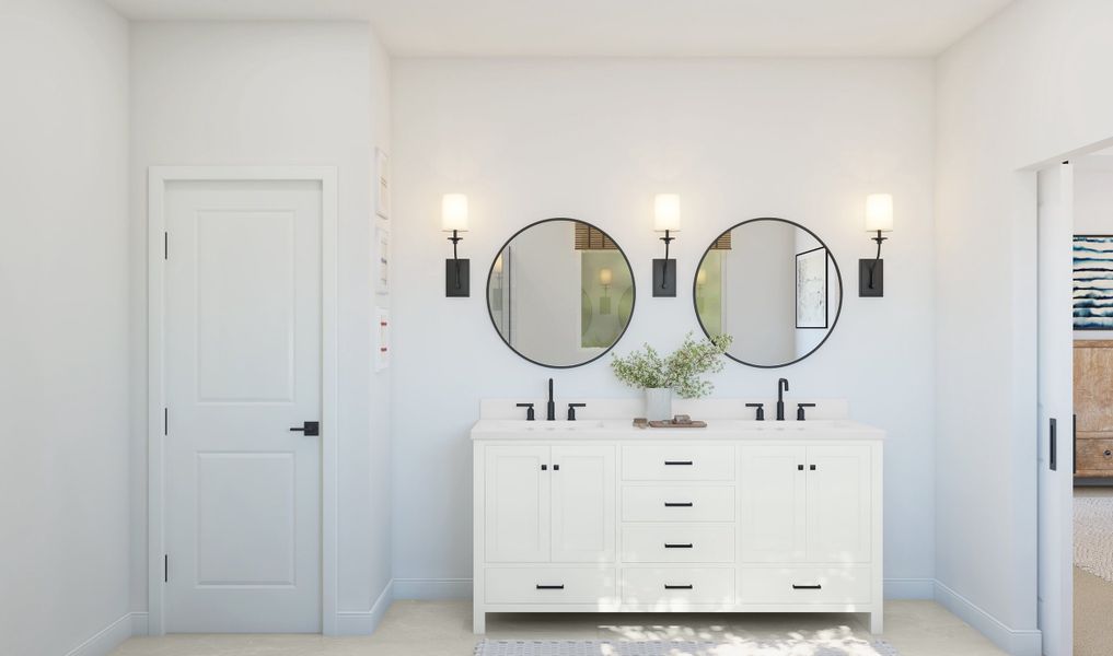 Primary bath with circle mirrors and freestanding vanity