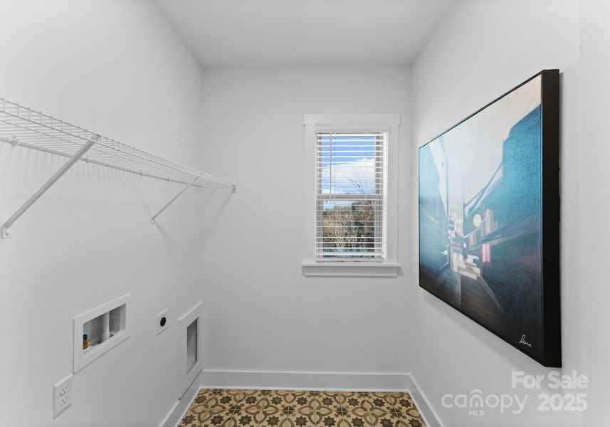 Photo is of model home in community, finishes may vary