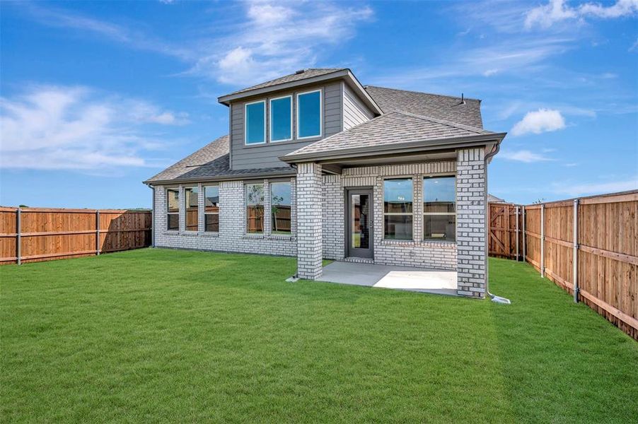 Exterior details and patio area of a home in Lily Creek at Sutton Fields, Aubrey (Image 20).
