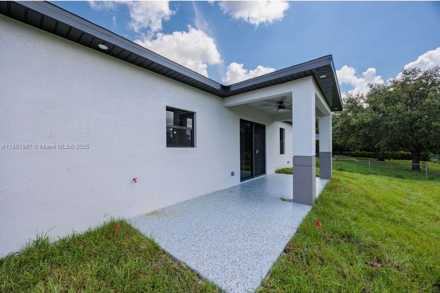 Front exterior of a new home in , Lehigh Acres, FL, highlighting curb appeal (Image 16). Front exterior of a new home in , Lehigh Acres, FL, highlighting curb appeal (Image 16).