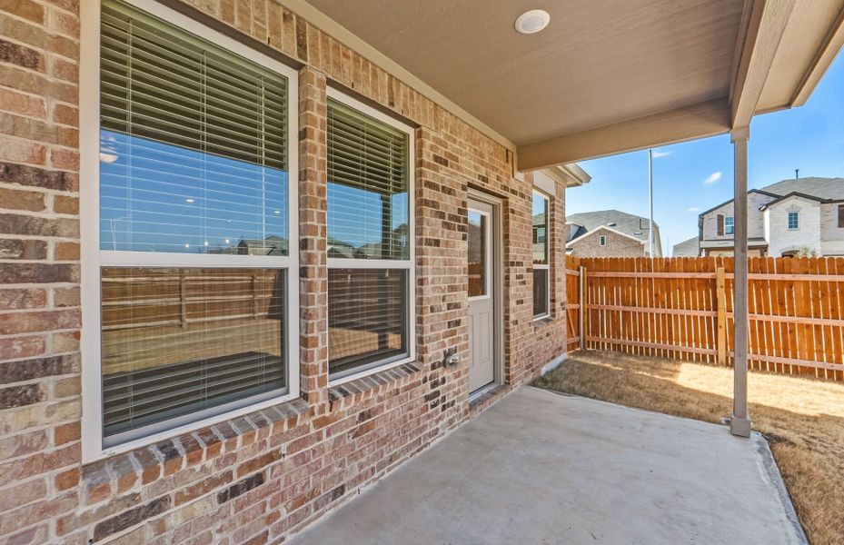 Exterior details and patio area of a home in Lagos, Manor (Image 24).
