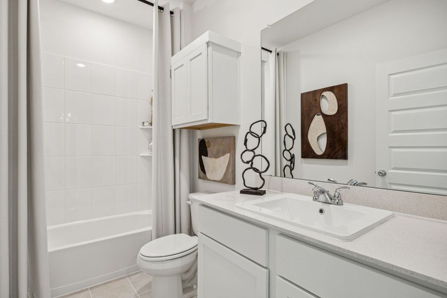 Bathroom in the Trinity home plan by Trophy Signature Homes – REPRESENTATIVE PHOTO Bathroom in the Trinity home plan by Trophy Signature Homes – REPRESENTATIVE PHOTO