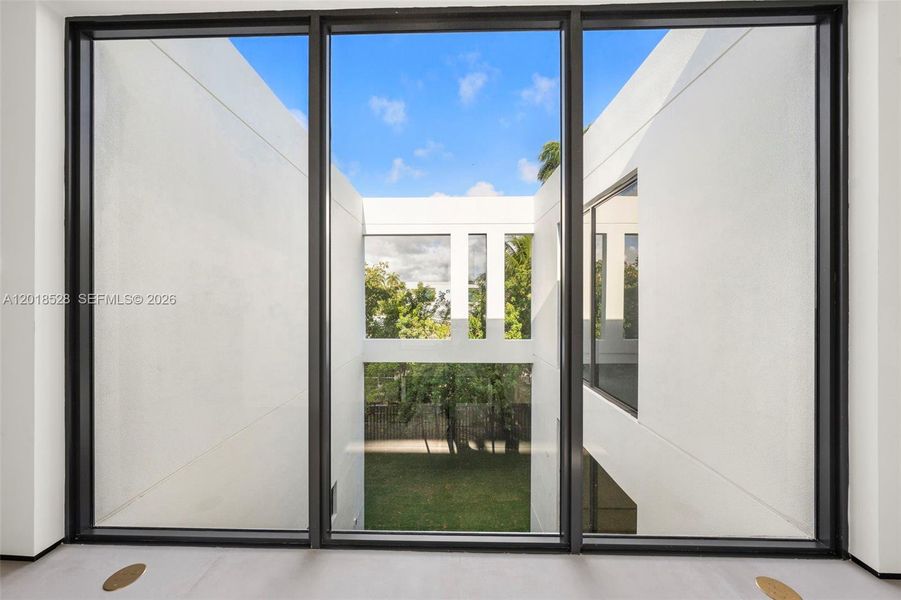 Exterior details and patio area of a home in , North Miami (Image 31).