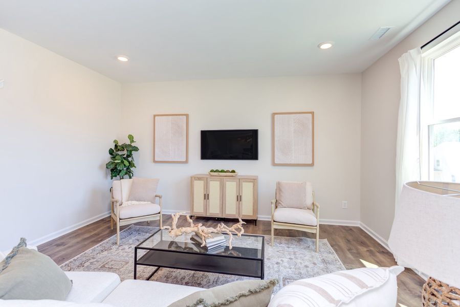 Representative furnished interior of a home built from the The Poppy by Chesapeake Homes in The Willows, Loris (Image 8).