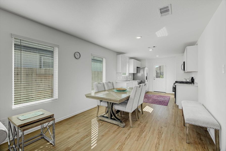 Furnished interior view inside a new home in Pinewood at Grand Texas: Colonial & Cottage Collections, New Caney (Image 9).