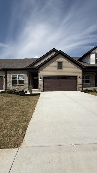 Front exterior of a new home in Veterans Cove, Murfreesboro, TN, highlighting curb appeal (Image 2). Front exterior of a new home in Veterans Cove, Murfreesboro, TN, highlighting curb appeal (Image 2).