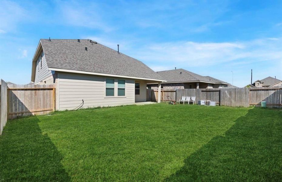 Exterior details and patio area of a home in Legends Bay, Baytown (Image 27). Exterior details and patio area of a home in Legends Bay, Baytown (Image 27).