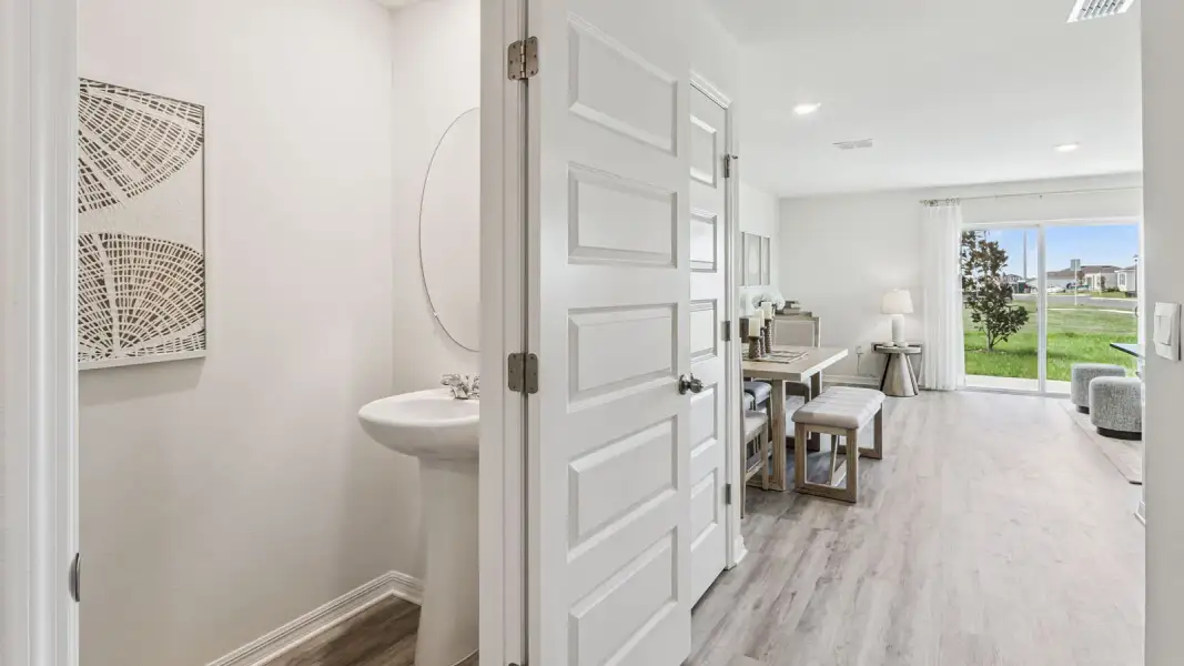 Furnished interior view inside a new home in Atria at Ridgewood Lakes, Davenport (Image 25).