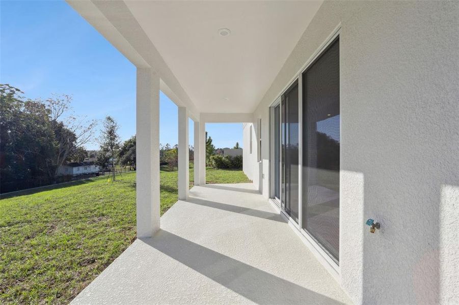 Exterior details and patio area of a home in Eden Crest, Apopka (Image 4).