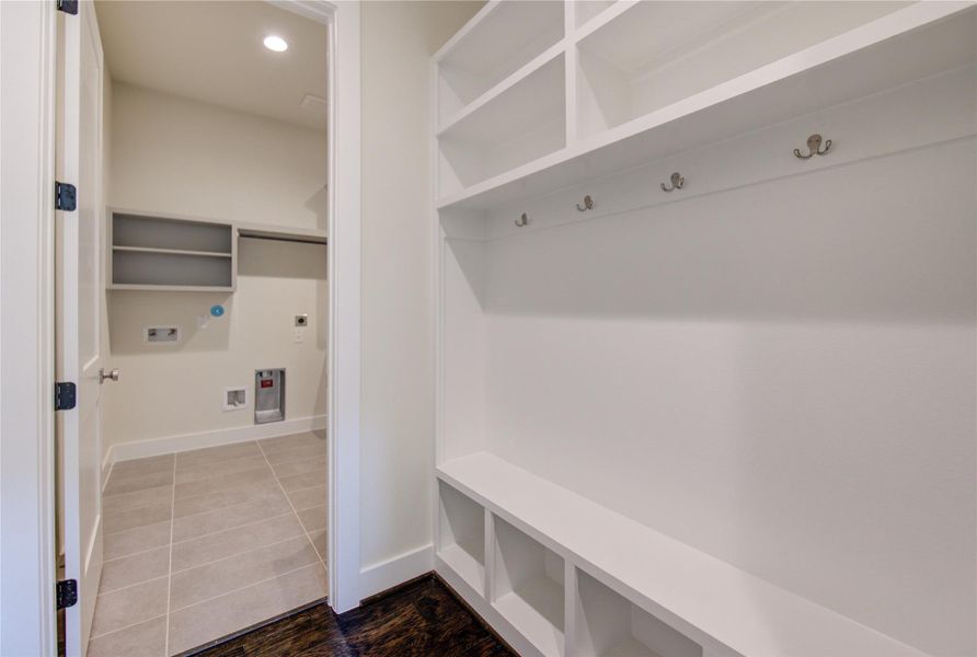 Mud room is connected to the laundry room and next to the garage Mud room is connected to the laundry room and next to the garage