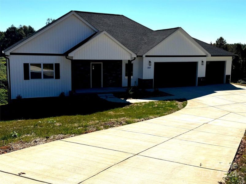 Large driveway and 3 car garage