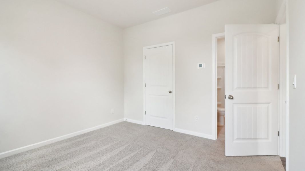 Representative unfurnished interior of a home built from the Asbury by D.R. Horton in Overlook at Peachtree Corners, Norcross (Image 41).