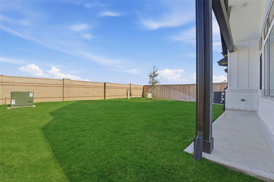 Exterior details and patio area of a home in , Cypress (Image 3).